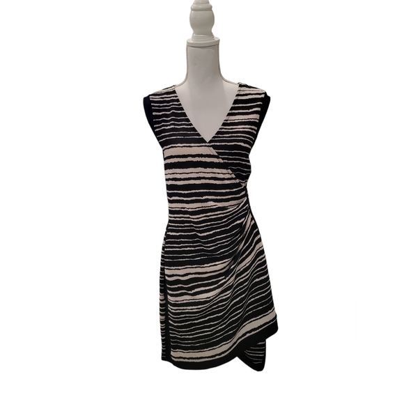 Ricki's Dresses & Skirts - Ricki's Faux Wrap Dress